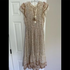 New with tags absolutely gorgeous love stitch midi dress